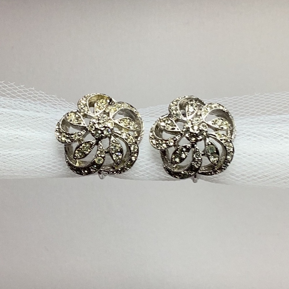 Vintage crystal swirl clip on earrings.